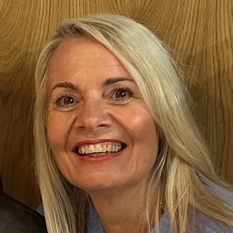 Portrait of Sarah Kennedy smiling.