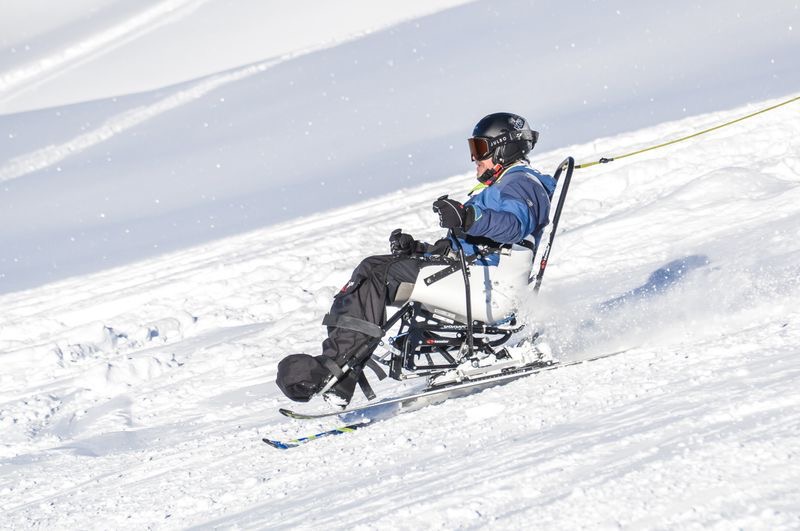 Patrick sit skiing