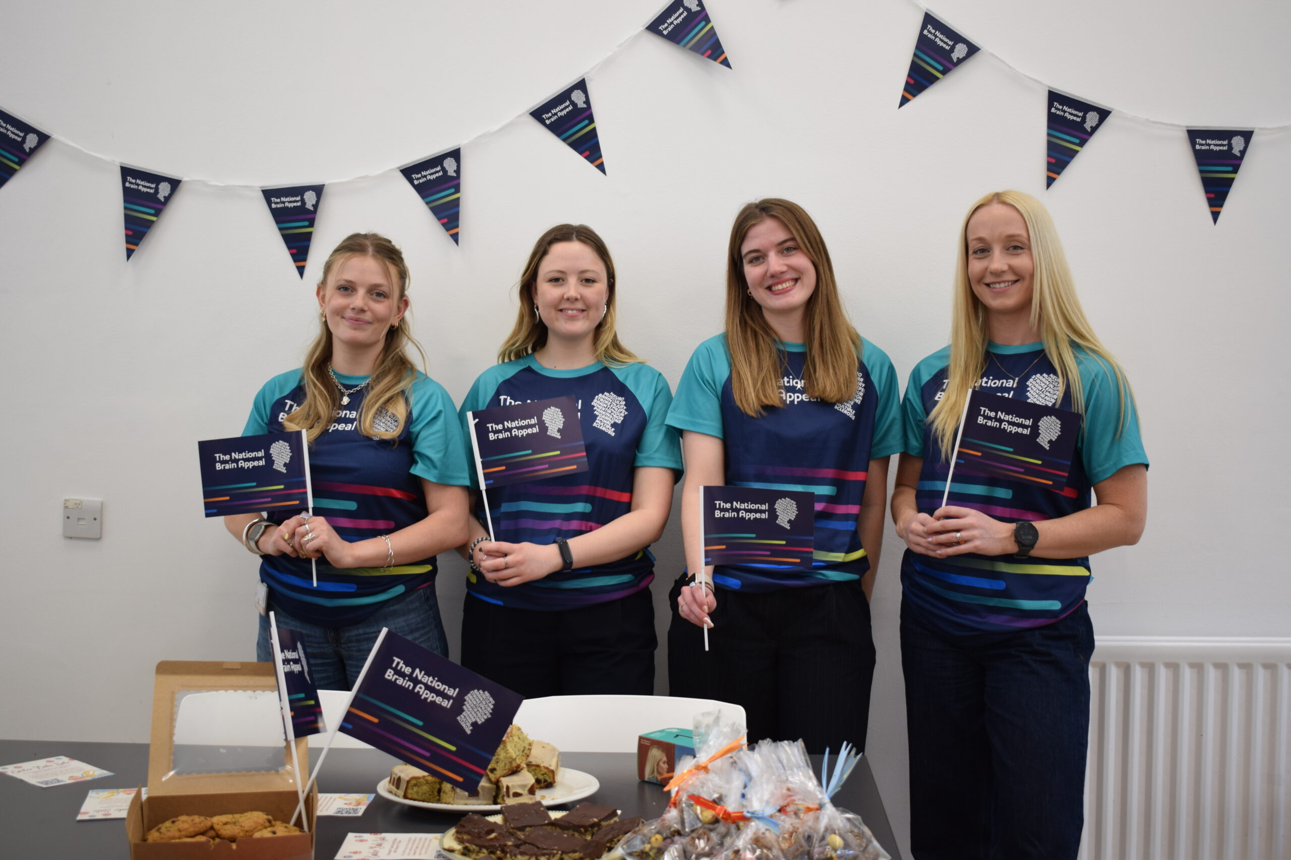 The GENFI research team at their Easter Bake Sale. L-R Sophie Farley, Eva Cullen, Sophie Goldsmith and Rhian Convery. Photo credit Marie Mangan (1)